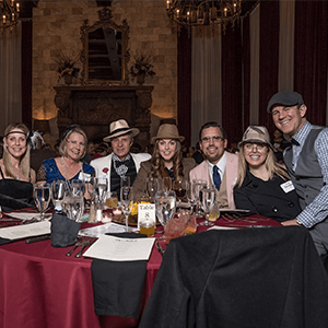 New York Murder Mystery party guests at the table