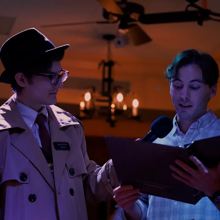 Professional actors performing at a New York murder mystery