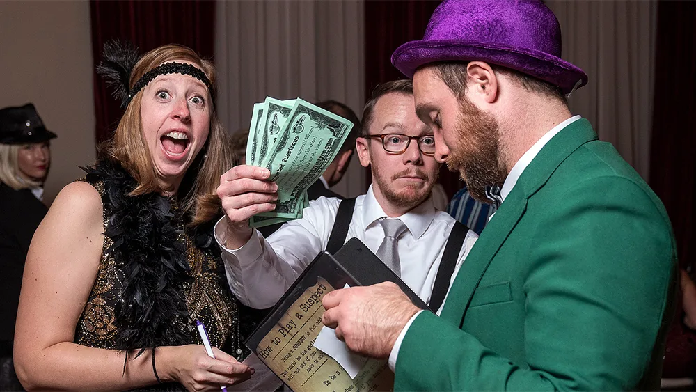 Guests enjoying a New York murder mystery party